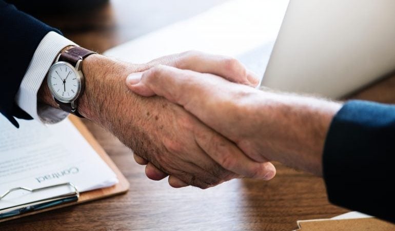 Two men shaking hands