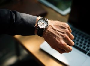 A man looking at the watch