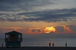 Miami Beach, people at the beach, sunset