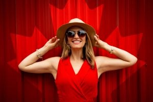 woman in front of canada's flag