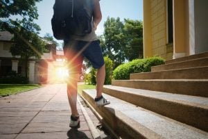 A man standing on a few steps