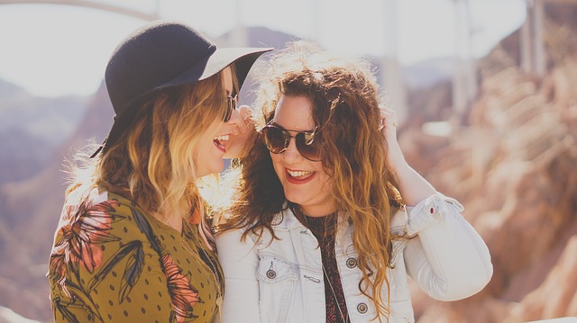 Two girls laughing.