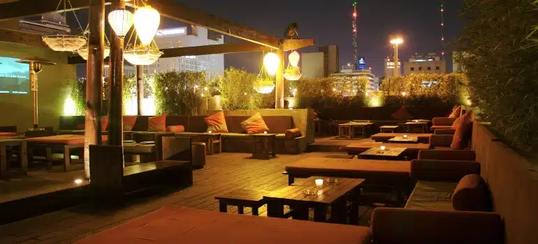 An empty rooftop bar at night