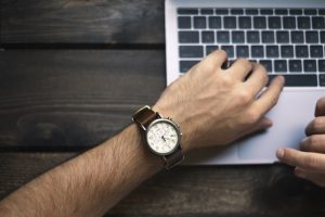 Person looking at their watch.