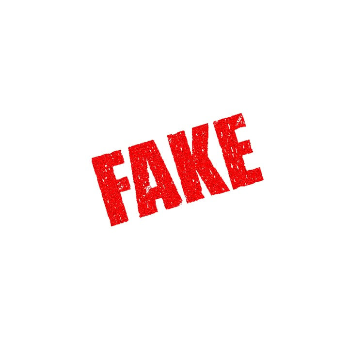 a sign that says FAKE