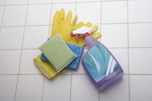 Cleaning supplies on tile