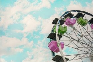 A green and pink Ferris whee.