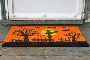 Black and orange welcome mat.