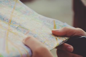 A person holding a map.