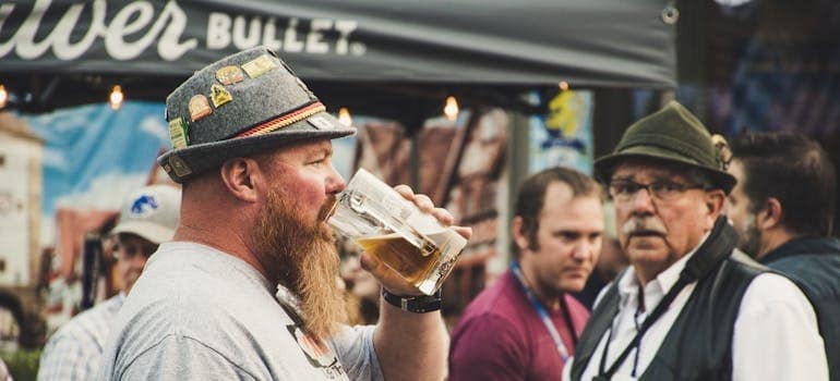 Man Drinking from a Beer Pint
