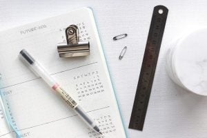 A calendar, pen and a ruler