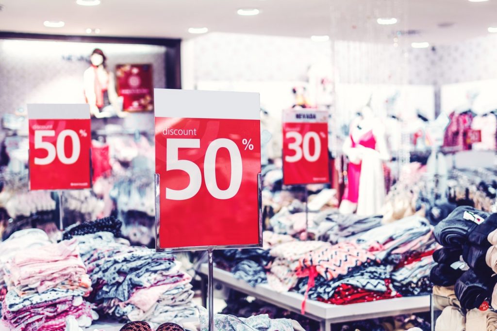 Discount signs at a clothing store
