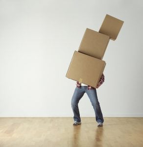 A man with moving boxes.