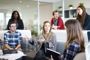 Coworkers discussing something