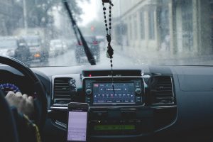 the interior of the car and rain outside