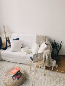 a rug, a coffee table and a couch