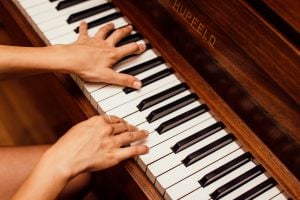 a person playing a piano