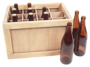 Picture of bottles in a wooden crate. Packing liquids for an interstate move requires quality packing supplies