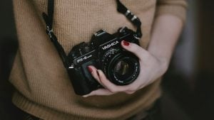 Picture of a girl holding a camera