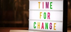 'time for change' written on a glowing background