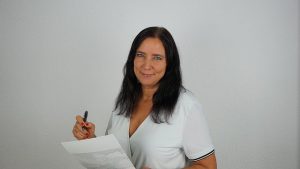 Moving estimator holding a paper