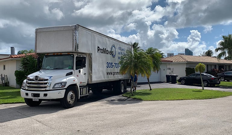 A moving truck belonging to movers who will help you with insurance. 