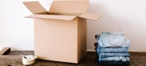 A box and some jeans ready to be packed