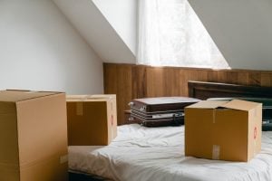 moving boxes on the bed