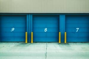 a storage unit with blue doors and numbers 9, 8, and 7.