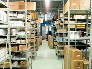 A storage unit filled with boxes and belongings