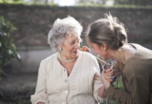 Two women talking.