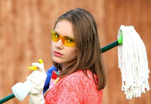 handling mold in your home - women reading to clean