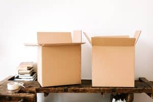 two cardboard boxes on a desk