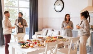 People standing near dining table