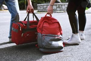 red bag and a backpack