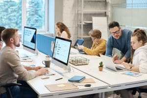 team working at an office on computers