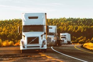 white trucks on the road