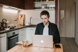 person working on the laptop, home office