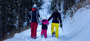 A family dressed in winter clothes