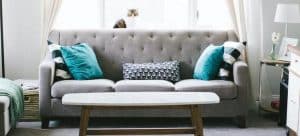 white sofa with blue pillows