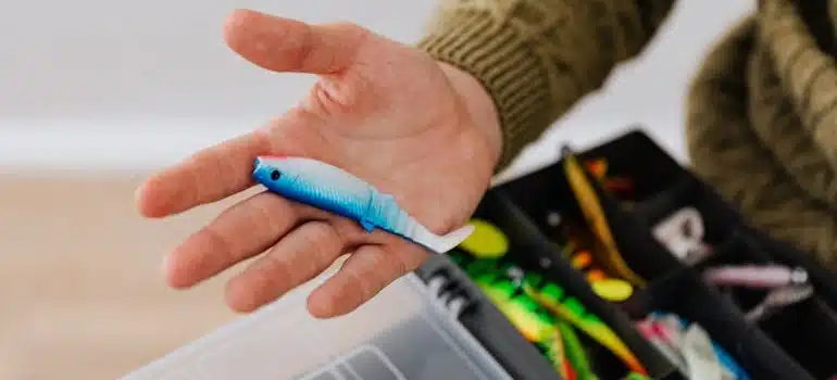 A fishing lure without a hook on a palm