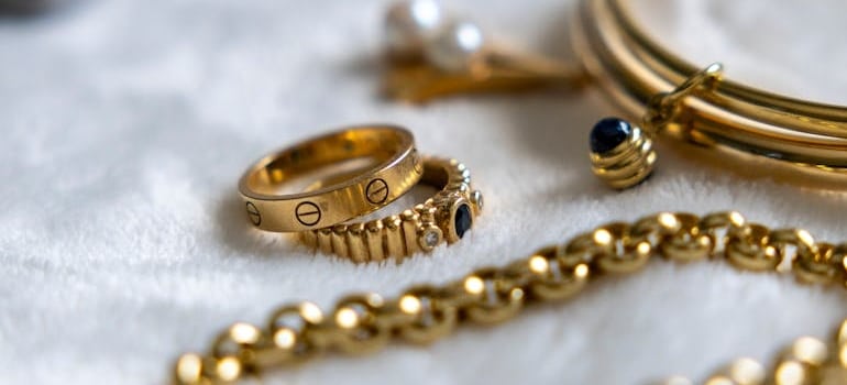 Elegant Assortment of Gold Jewelry on Soft Background