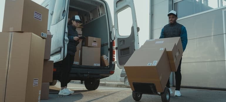 Movers moving a library in Miami.