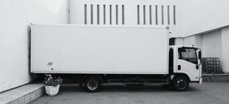 Moving antique furniture with a white truck