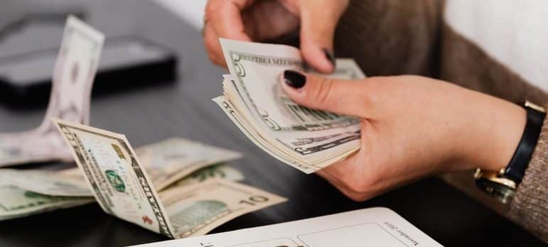 a woman counting money