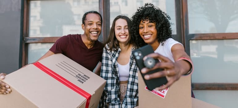 three people taking a selife