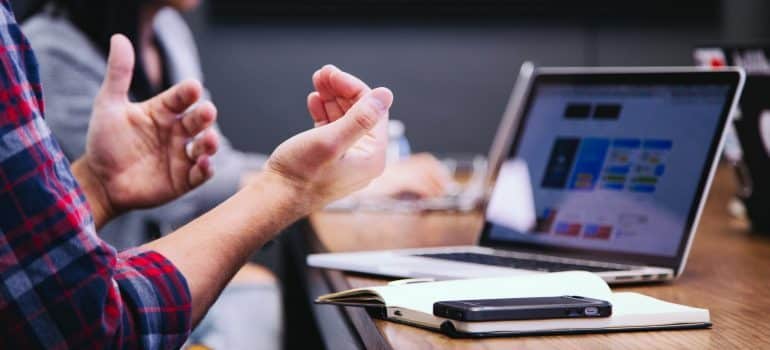 a man explaning something in the office