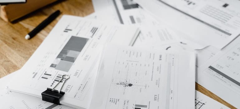 documents scattered on the table