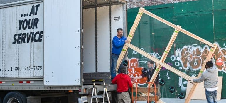 professional movers loading the truck 