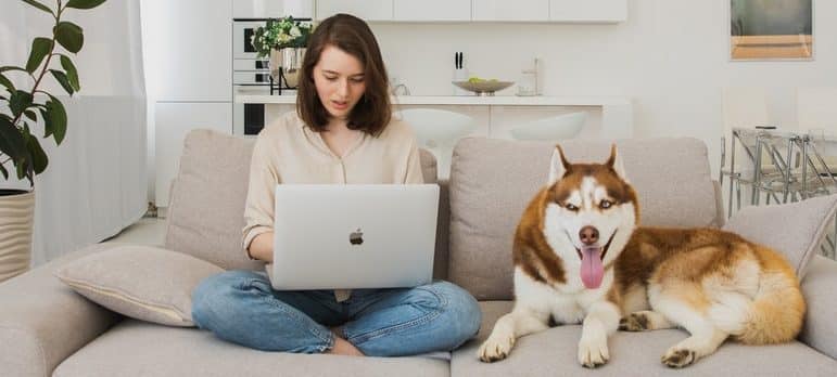 a woman conducting the long-distance job search before moving